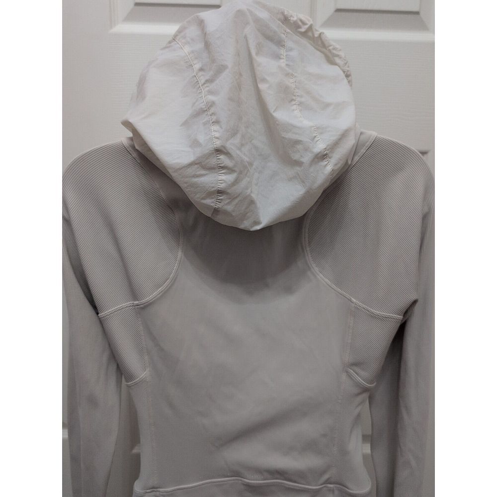 Lululemon Far and Free Jacket White Size 8 Hidden Hood Nulux Thumbholes Grip Hem - Picture 6 of 8